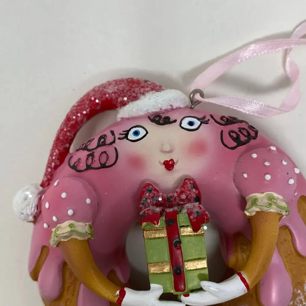Ornament donut with face and legs